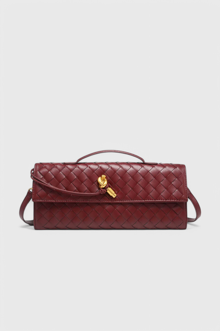 Melanie Clutch -laukku kultaisella solmuyksityiskohdalla
